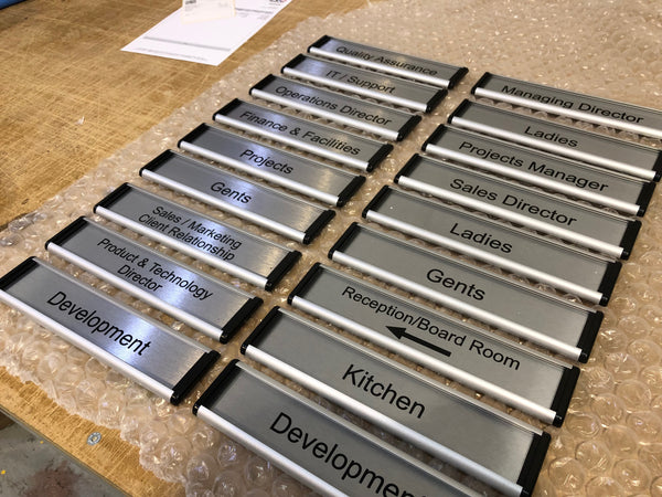 Viro Curve Changeable Door Signs for Warwick International Computing Systems